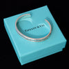 EVEYSPRELOVED Tiffany and Co Silver Roman Numeral Bangle Bracelet