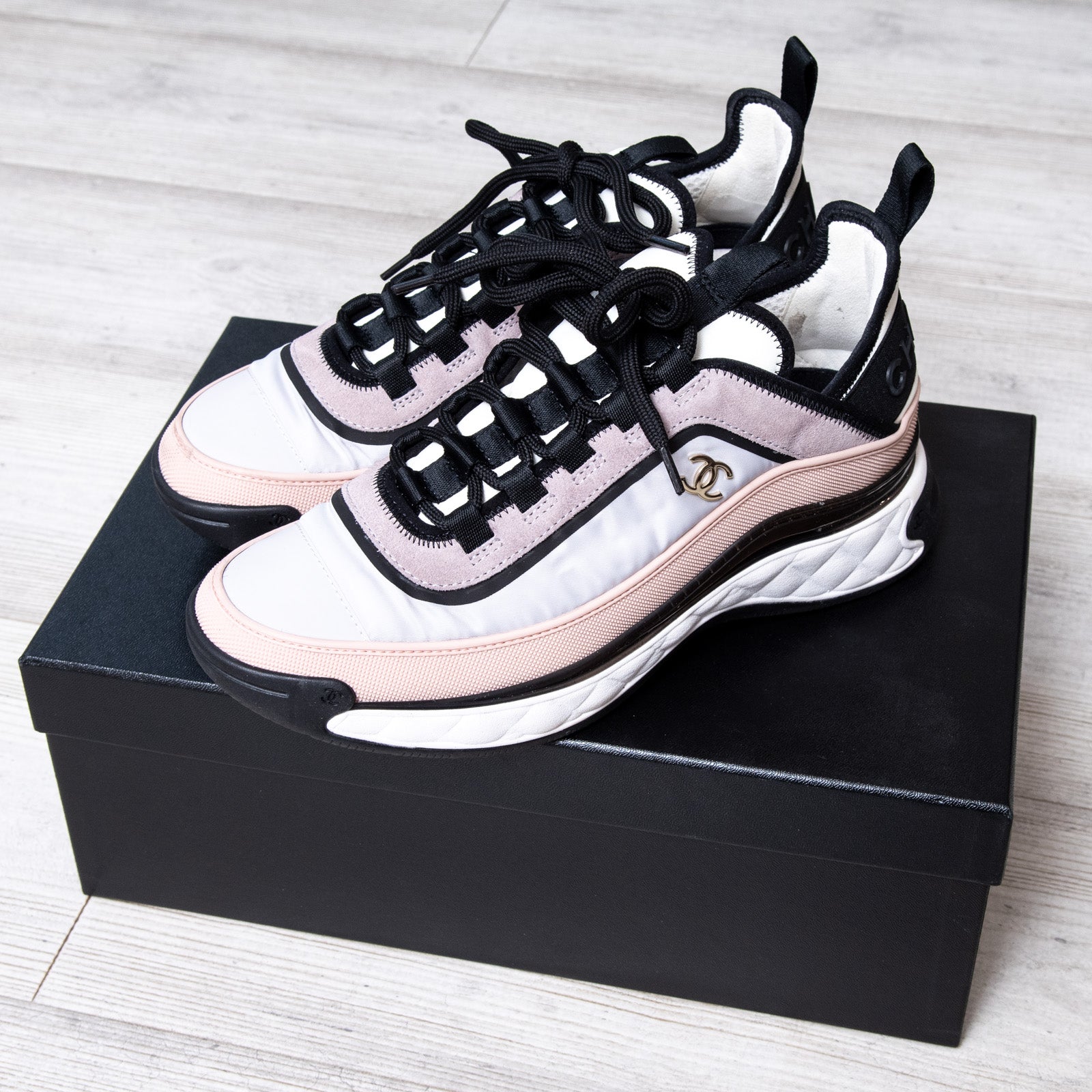 Chanel pink cheap and black sneakers