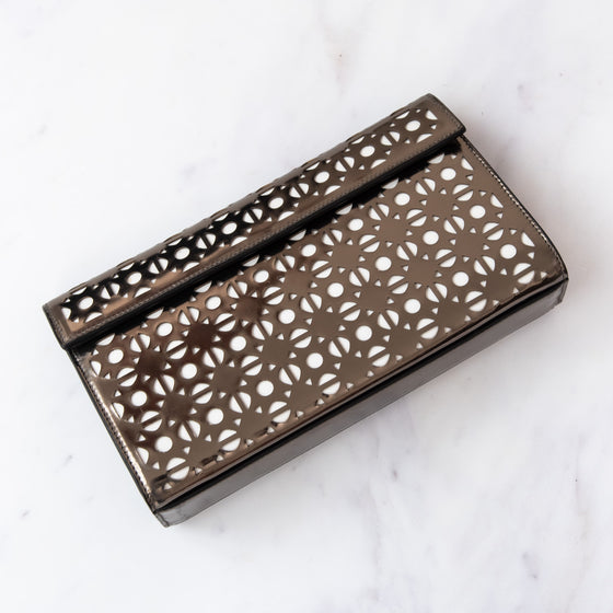 Alaia Metallic Laser Cut Patent Leather Clutch