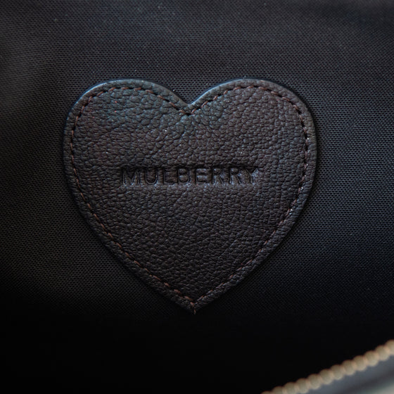 The Mulberry x Cara Delevingne Camo Print Leather Clutch Bag