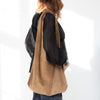 The Row Bindle Suede Bag