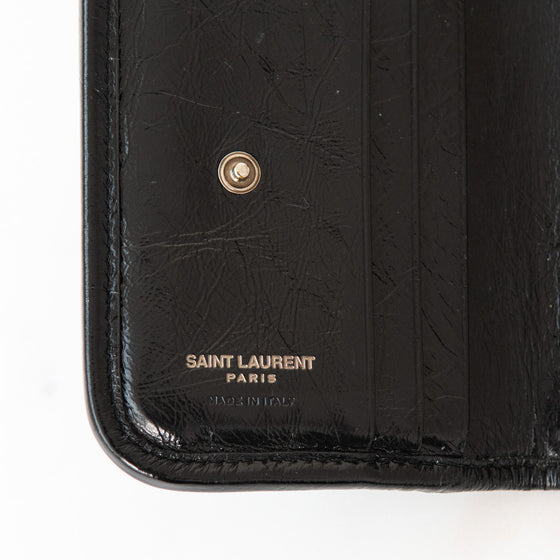 Saint Laurent Crinkled Calfskin Matelasse Monogram Niki Fold Wallet