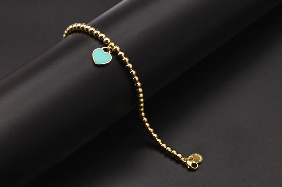 Tiffany & Co Heart Tag Bead Bracelet in Yellow Gold 8.5g